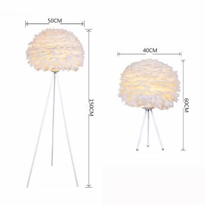 China 2021 Nordic Amazon feather table light modern luxury goose feather led table lamps bedroom gold feather table lamp warm lighting for sale