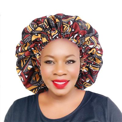 China Amazon Sustainable Hot Selling African Fashion Printed Satin Striped Large Headscarf Nightcap for sale