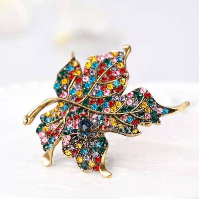 China 2019 new design fashion leaf shape faux stone trendy crystal brooches, wedding brooch flower for sale