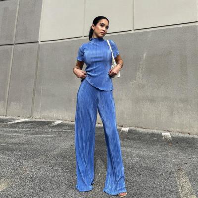 China 2022 New Arrivals Summer Fashionable Women's Breathable Neck Short Sleeve T-Shirt With Pants Solid 2 Piece Set for sale