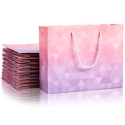 China Recyclable Craft Shopping Flower Custom Logo Jewelry Texture Kraft Paper Bags With Handle for sale