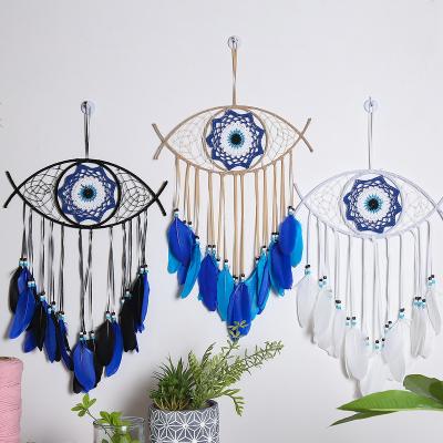 China Art Deco Wholesale Handmade Bohemian Evil Eye Feather Catcher Blue White Craft Ornament Feather Wall Hanging Home Decor for sale