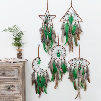 China Art Deco Boho Interior Wall Hanging Metal Led Moon Star Evil Eye Kids Catcher Dreamy Feather Handmade Home Room Decoration for sale