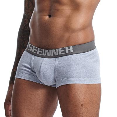 China Breathable Cheap Boxer Comfortable Seamless Custom Logo OEM Knitted Fabric Butt Lifter Enhancer Cotton Spandex Briefs Mens Underwear for sale