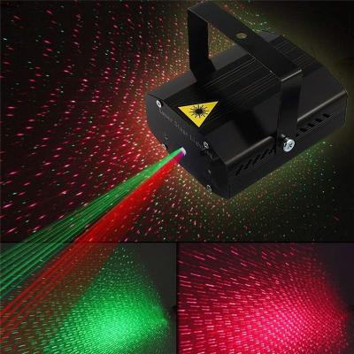 China red & green beams led portable remote control portable stage dj disco light projector laser lights noise activated flash for christmas party wedding for sale