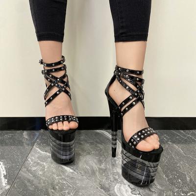 China Custom Fashion Trend Xinzirain Women Lace Up Metal Patent Leather Pole Dancing Heeled Sandals Platform Stripper Heel With Glitter Strings Logo for sale