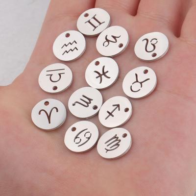 China TRENDY DIY Set 12mm High Quality Gold Polished Stainless Steel Packaging Hollow Zodiac Disc Constellations Different Charms For Jewelry for sale