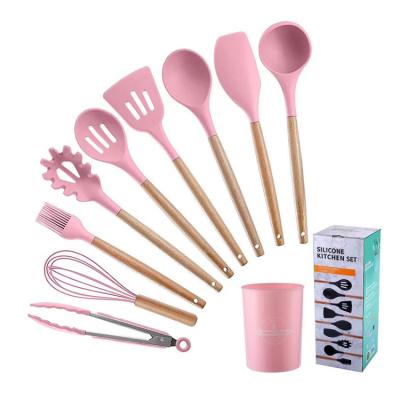 China Amazon best selling wooden handle pink color silicone kitchen utensils viable set kitchen tools kitchen tableware cookware set 9 for sale