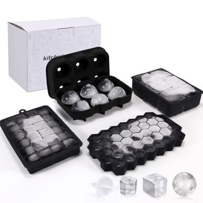 China Non Viable Stick Ice Maker Grip Silicone Cube Tray And Ball Whiskey Tray Mold Set 4 Piece Ice Cube Tray With Cover for sale