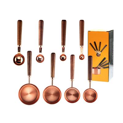 China New Viable Custom Made Rose Good Tea Coffee 8pcs Metal Handle Kitchen Stainless Steel Wooden Measuring Cups and Spoons Set for sale