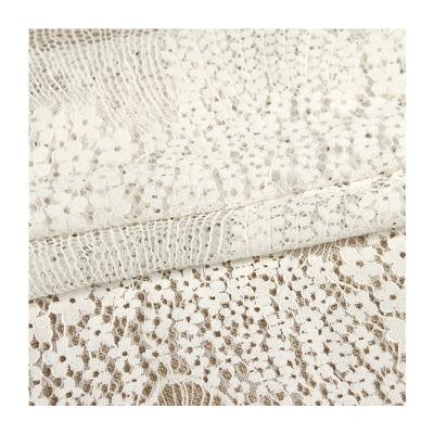 China Viable Wholesale High Quality Small Exquisite White Large Hole Floral Lace Fabric for sale