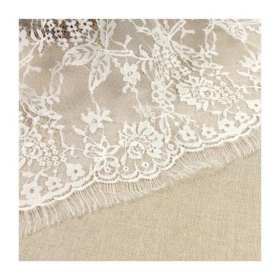 China Viable Selling Cheap Popular Nylon Cotton White Embroidery Flower Lace Fabric For Clothing for sale