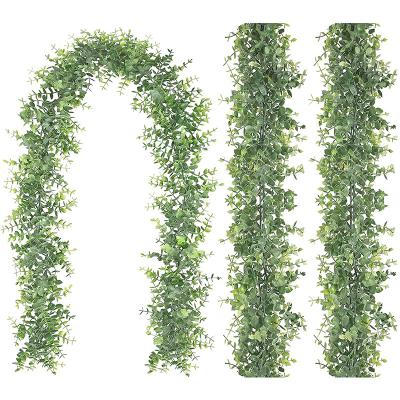 China Realistic Artificial Eucalyptus Wreath Faux Vines Amazon Green Plants Hanging Plant Wedding Background Decoration for sale