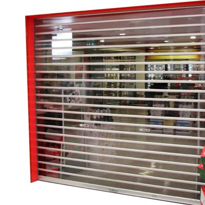 China Anti-aging commercial store transparent polycarbonate sheet roll up automatic aluminum clear door roller shutter doors for sale