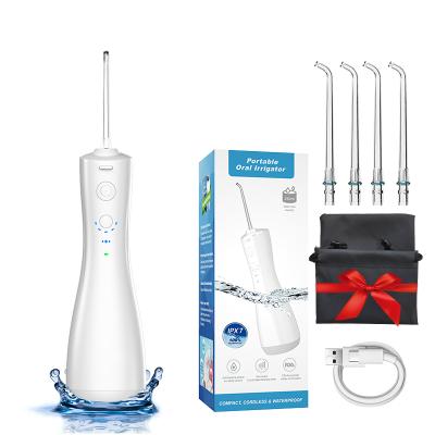 China Hotel high capacity portable oral irrigator toothpick ipx7 usb water pressure waterproof dental flosser for sale