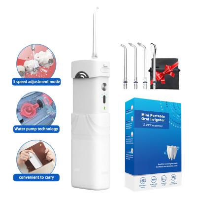 China Hotel Dental Care Ipx7 Waterproof Mini Oral Irrigator Deep Cleaning Cordless Water Jet Dental Flosser for sale