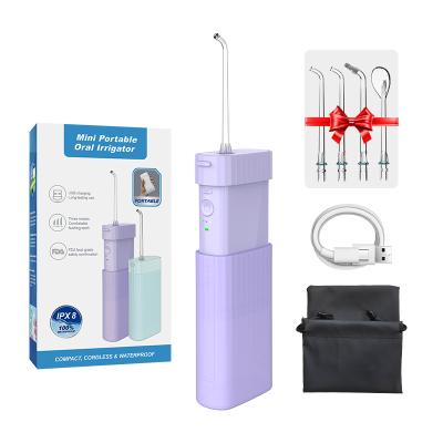 China Hotel 3 Modes Usb Charging 140ml Water Tank Dental Care Water Flosser Toothbrush On Desktop for sale