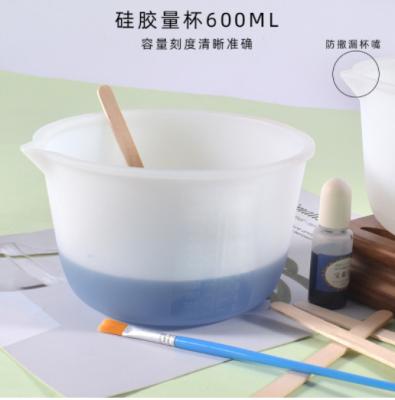 China Diy 600ml Viable Crystal Drop Resin Mold With Graduated Silicone Measuring Cup for sale