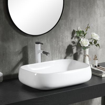 China Chaozhou Modern Ceramic Bathroom Wholesale Wash Basin Countertops Pure White Rectangular Basin For Hotel for sale