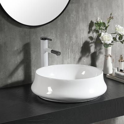 China Modern Nordic Simple Round Bathroom Countertops China Style Color Hand Sink Glossy White Sinks for sale