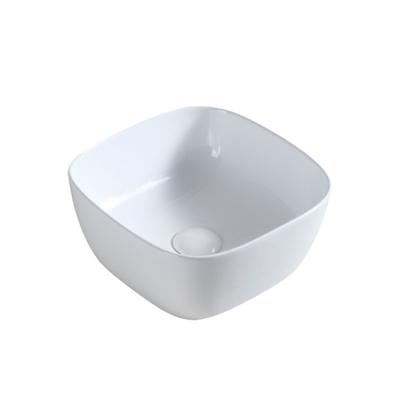 China Modern Nordic Small Size Rectangle White Bathroom Counter Top Basin Ceramic Wash Basin Hand Down Face Basin For Small Bathroom for sale