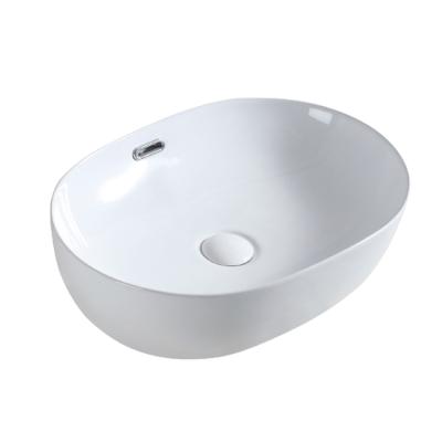 China Wholesale Modern Style Simple High End White Oval Bathroom Ceramic Hand Wash Drop Over Worktop Art Basin With Overfall Space for sale