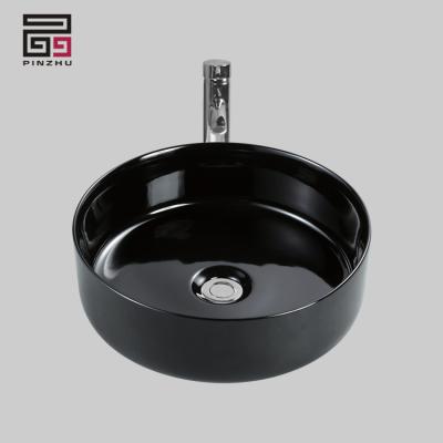 China Luxury Wholesale Shiny Black Color Ware Face Sink Circle Worktop Sanitary Basin for sale