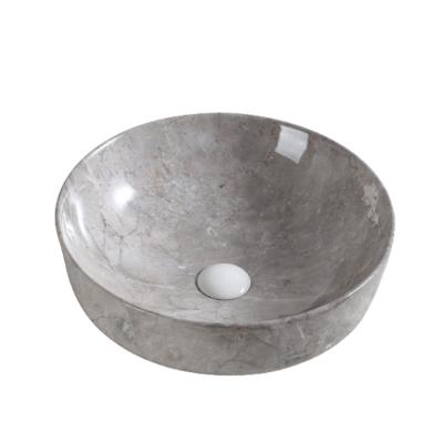 China Luxury Hot Selling Round Ceramic Marble Counter Top Bathroom Wash Sink Basin Above Counter Basins For Hotel for sale