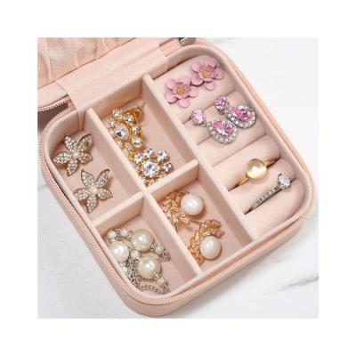 China Fashionable simple portable leather luxury pink jewelry storage box packaging for necklace earrings ring for sale