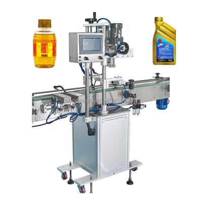 China Automatic Plastic Bottle Caps Food Oil Bottle Capper Screw Capping Machine Edible Oil Cap Machine for sale