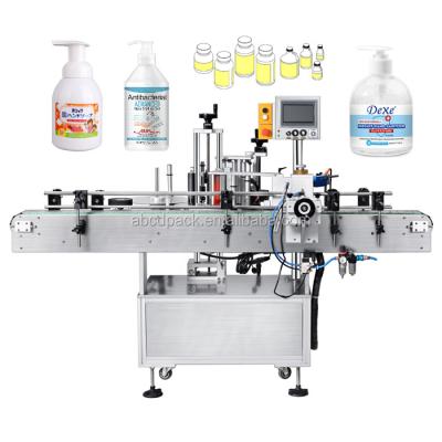 China Automatic Bottle Labeler Pump Sanitizer Food Hand Alcohol Round Bottle Sanitizing Labeling Machine for sale