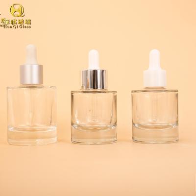 China Cosmetic Glass Bottle (New) Color Essential Oil Packaging Glass Bottles Custom Container Glass Jar With Dropper for sale