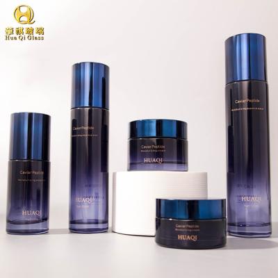 China Custom Logo Luxury Cosmetic Set Skincare Glass Bottles Cream Makeup Packaging Recyclable Glass Bottles For Cosmetic for sale