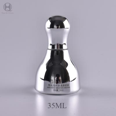 China 30ml Customized Glass Bottles Silver Cosmetic Glass Dropper Bottle for sale