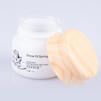 China China Mask/Cream Suppliers 100ml White Matte Glass Bottle With Wooden Lid Cosmetic Glass Bottle for sale