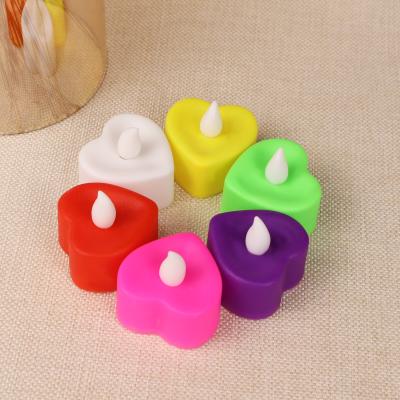 China Beautiful Flameless Heart Shape Electronic Flameless LED Wedding Decoration Candles Batteries Tea Light for sale