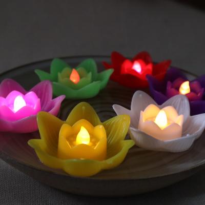 China Home Decor Battery Operated Warm White Flameless Led Lotus Candle Lights Led Lotus Birthday Flameless Water Floating Candle for sale