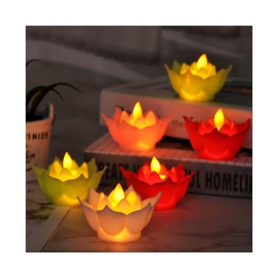 China COLOR CHANGING White Pink Green Green Dancing Candles Christmas Home Decor Dinner Wick Flameless Flower Shaped Led Lotus Candle for sale