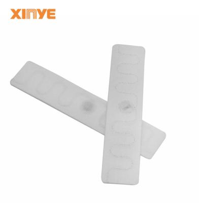 China Waterproof / Weatherproof wholesale UHF laundry nylon tag sew sticker on clothing for hotel beddings management for sale