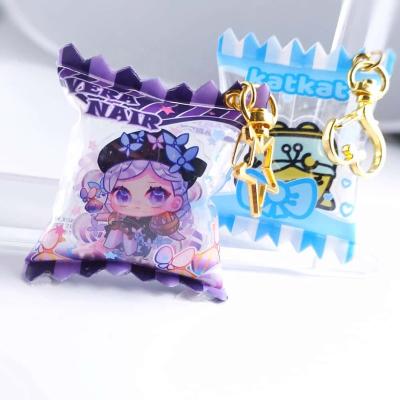 China DAQIDONG Custom Printing Transparent Acrylic Plastic Inflatable Candy Key Chain Candy Charms for sale