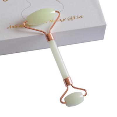 China Skin Tightening Rose Gold Rose Quartz Facial Natural Jade Roller Wholesale Double Roller Face Roller for sale