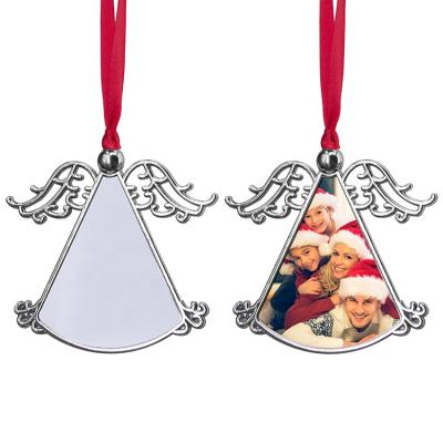 China Christamas Decoration Personalized Sublimation Blank Metal Angel Wing Christmas Tree Ornaments for sale