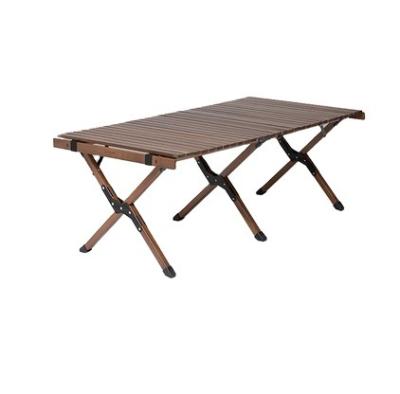 China Large Eco-friendly Indoor Outdoor Dining Table Low Price Walnut Egg Roll Table for sale