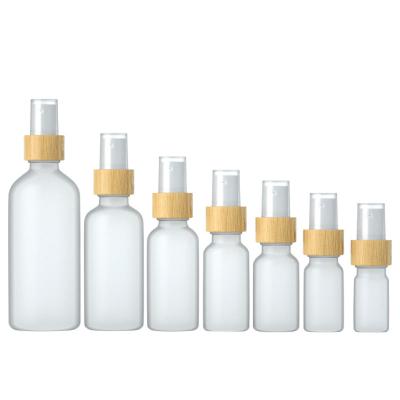 China 10ml Cosmetic Luxury Bamboo Collar Sprayer Glass Bottle Frosted Spray Bottles Glass Bottle Glass Supplier for sale