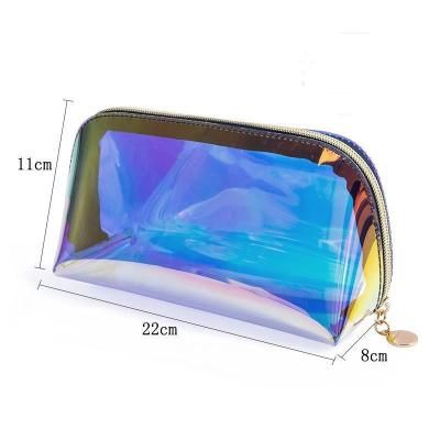 China Colorful Waterproof Durable Custom PVC Holographic Clutch Bag Travel Makeup Cosmetic Transparent Bag for sale