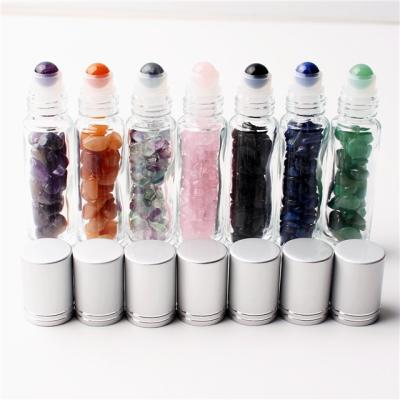 China Europe Wholesale Price Essential Oil Roller Bottles Clear Transparent Crystal Gravel Tumbled Roll Inside Glass Bottle For Sale for sale