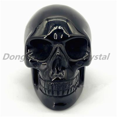 China Europe wholesale high quality crystal skulls carved 2 inch obsidian bone figurines collection craft gift stone trinkets for sale