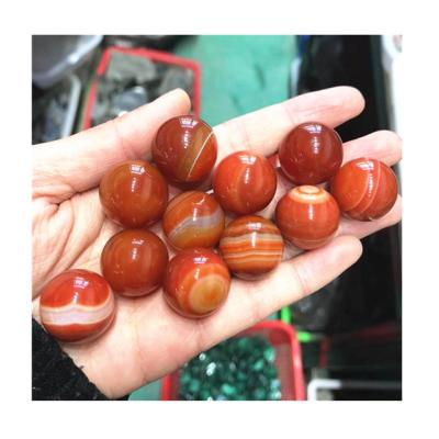 China China Wholesale Price Mini Natural Carnelian Ball Crystals Quartz Healing Home Decoration Red Agate Sphere for sale