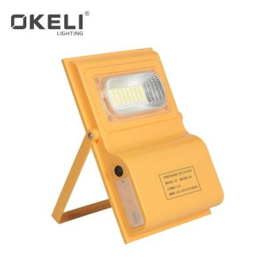 China New Arrival 30w ip65 outdoor high lumen OKELI portable solar rechargeable led flood light waterproof solar led flood light for sale