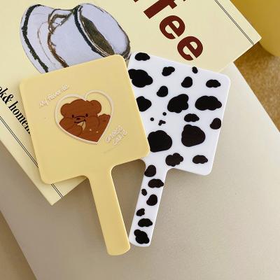 China Wholesale Custom Cute Beauty Travel Makeup Hand Held Mirror, Square Cows Plastic Makeup Mirror for sale